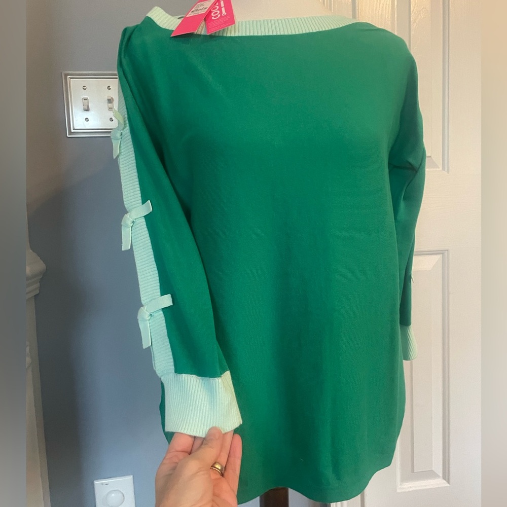 NWT Lilly sweater with cut out arm details